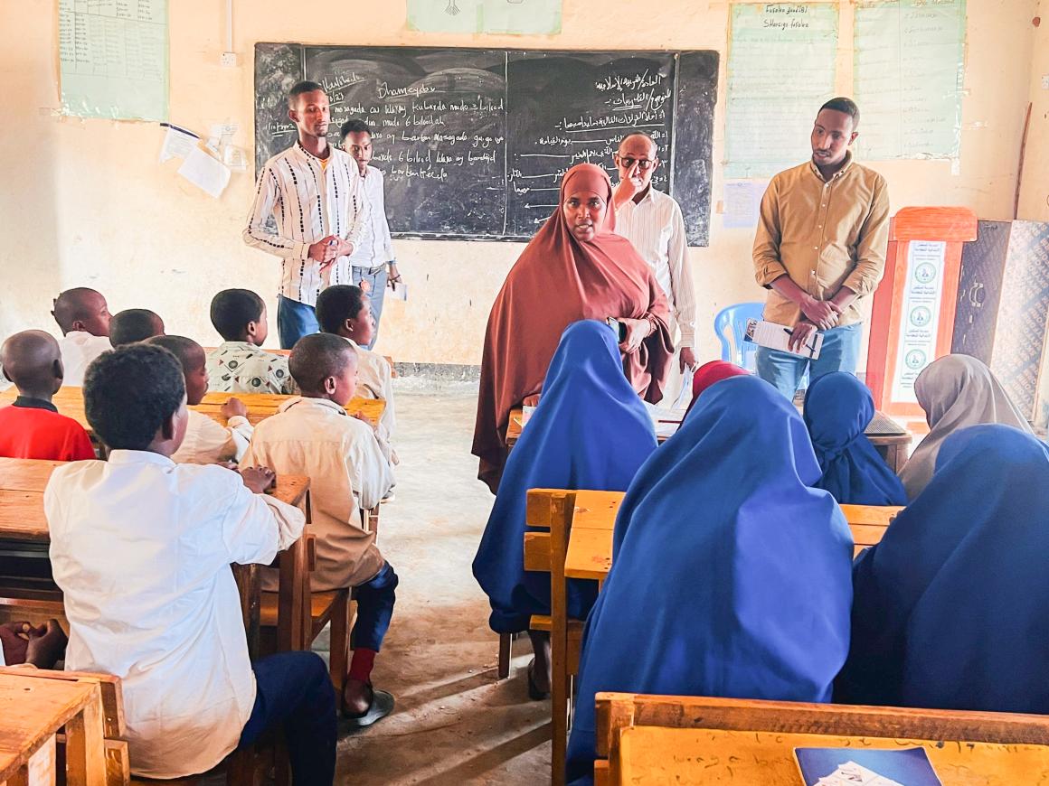 Teachers and principal in class 