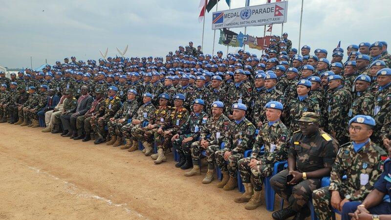 A group of peacekeepers pose for a photograph.
